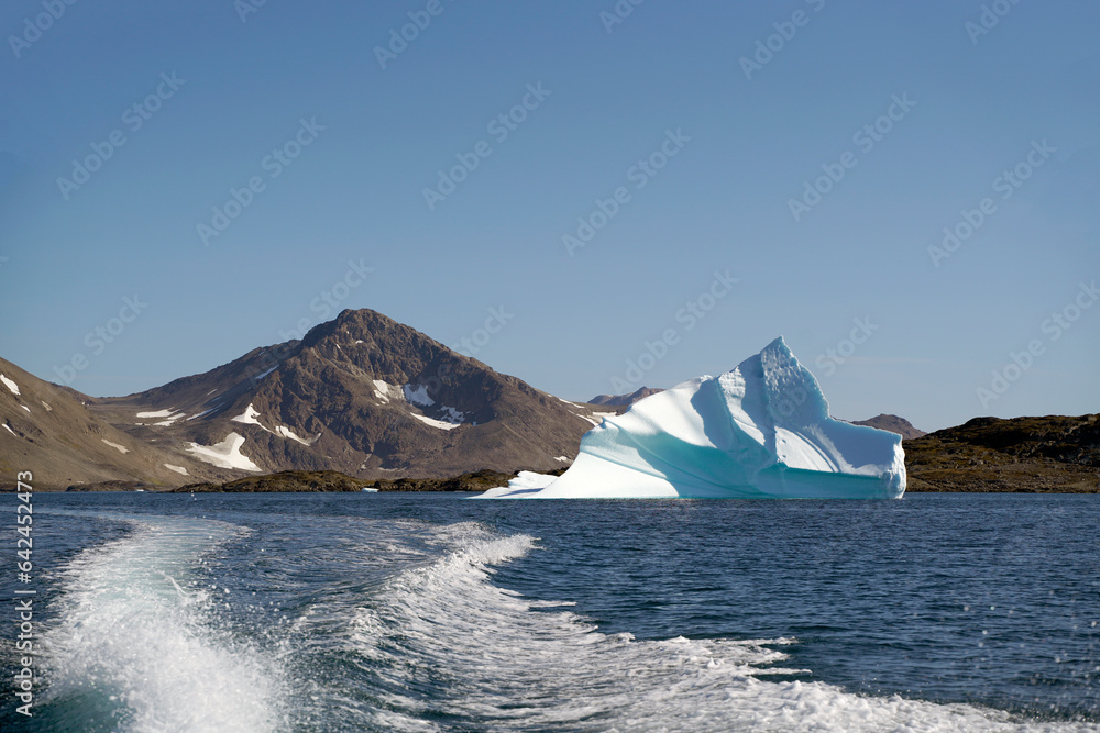 arctic iceberg floating on arctic ocean in greenland arctic iceberg floating on arctic ocean in greenland
