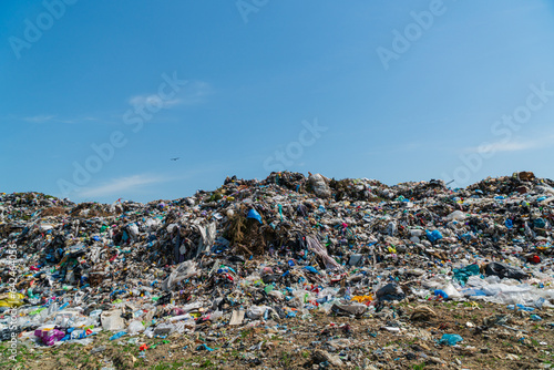 A large pile of garbage is in a landfill. Household waste garbage. Problems with waste processing © Jenya Smyk