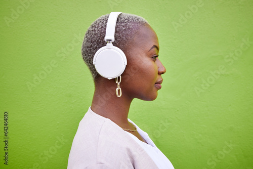 Photography Music headphones, profile and black woman listening on green wall background mockup space