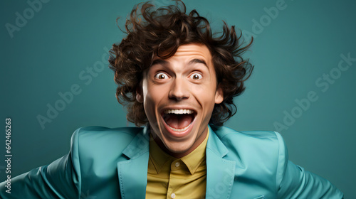 Portrait of a man with wavy hair very excited © Pete Garrison