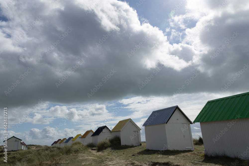 Beach cabins and seashore in Gouville sur Mer, Manche, Normandy, France in various lights Beach cabins and seashore in Gouville sur Mer, Manche, Normandy, France in various lights