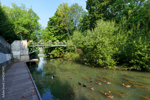 Footbridge to the Charentonneau island iand Marne river bank in Maisons-Alfort city  photo