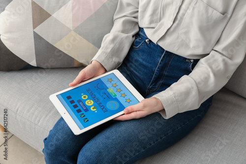 Woman with tablet computer ...