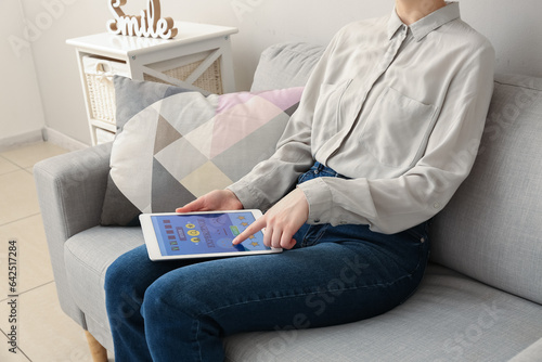 Woman with tablet computer ...