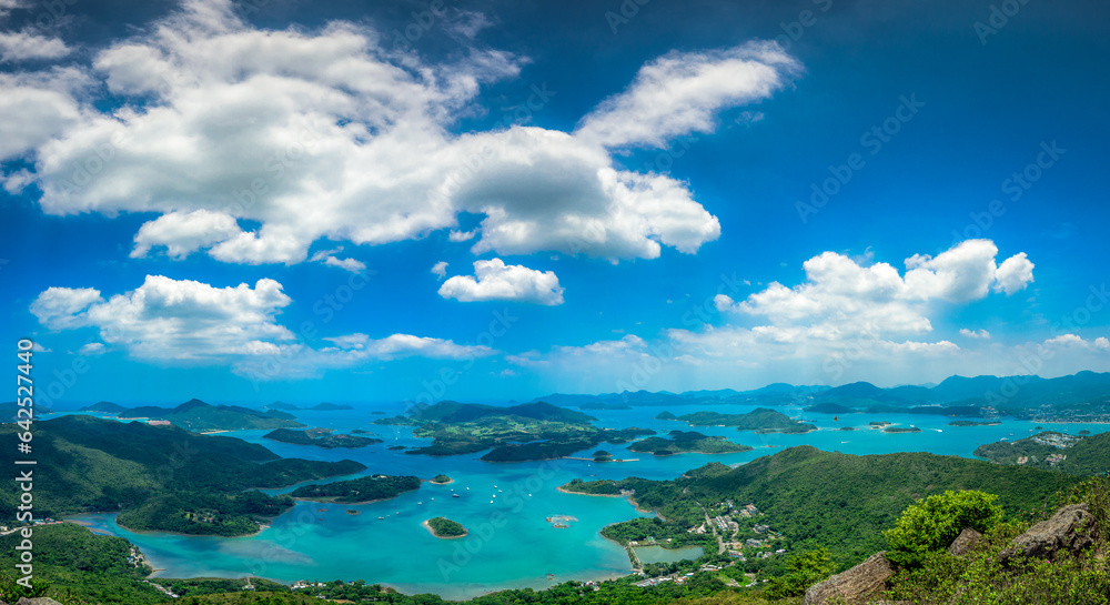 blue sky and clouds over lake of Tsam Chuk Wan