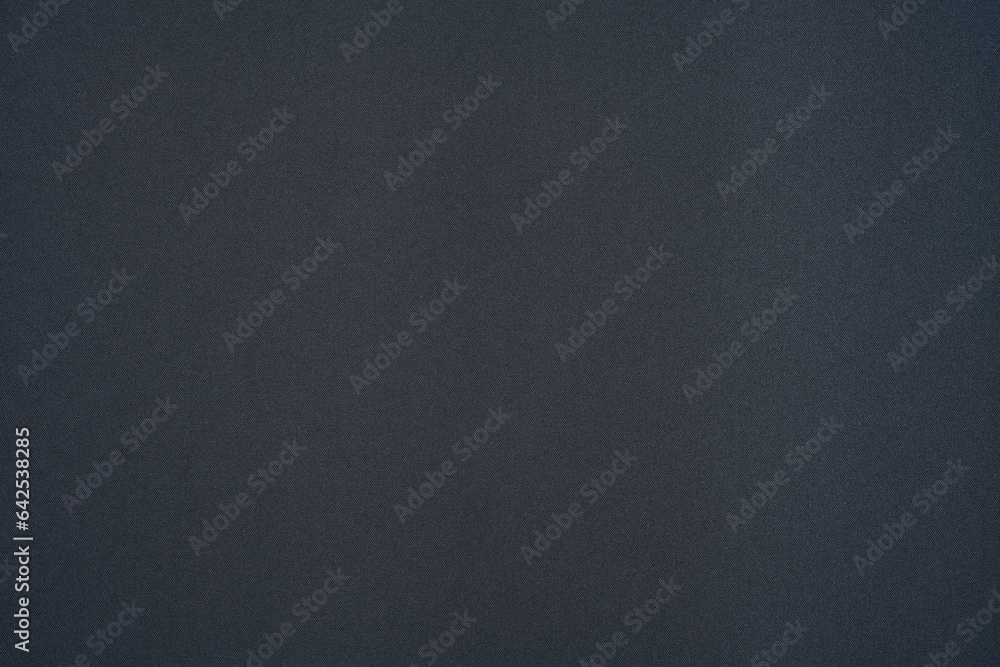 Dark gray fabric with a subtle diagonal pattern. Synthetic fabric with a slight sheen.