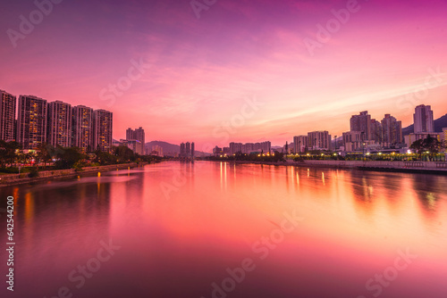 city skyline at sunset at shueng mun river