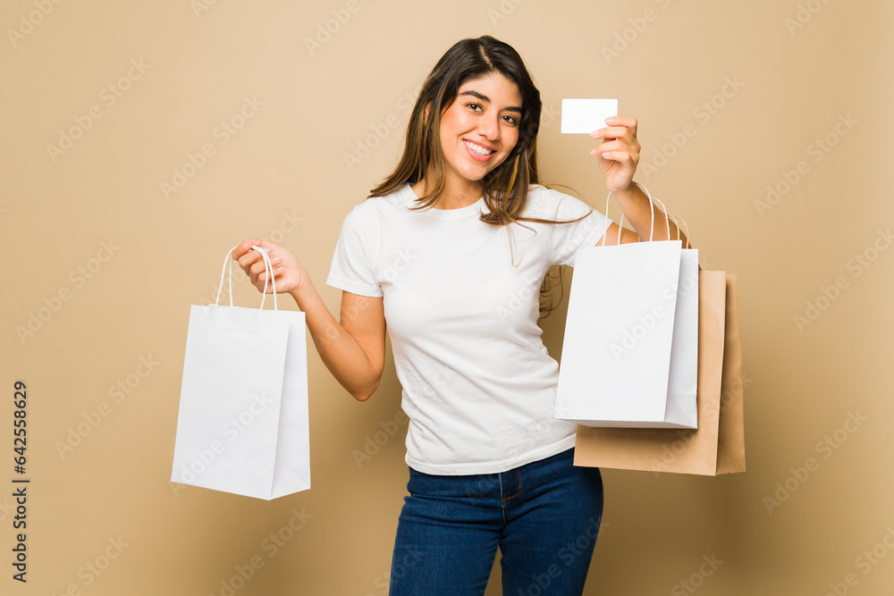 Cheerful woman with blank shopping bags Cheerful woman with blank shopping bags