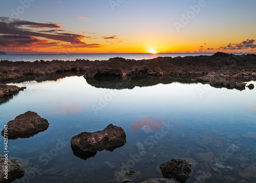 Sunset at Sharks Cove Oahu, Hawaii. 