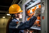 commercial electrician working on a fuse box