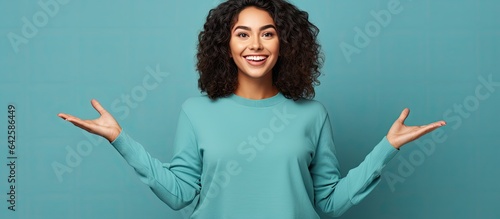 Excited young Hispanic woma...