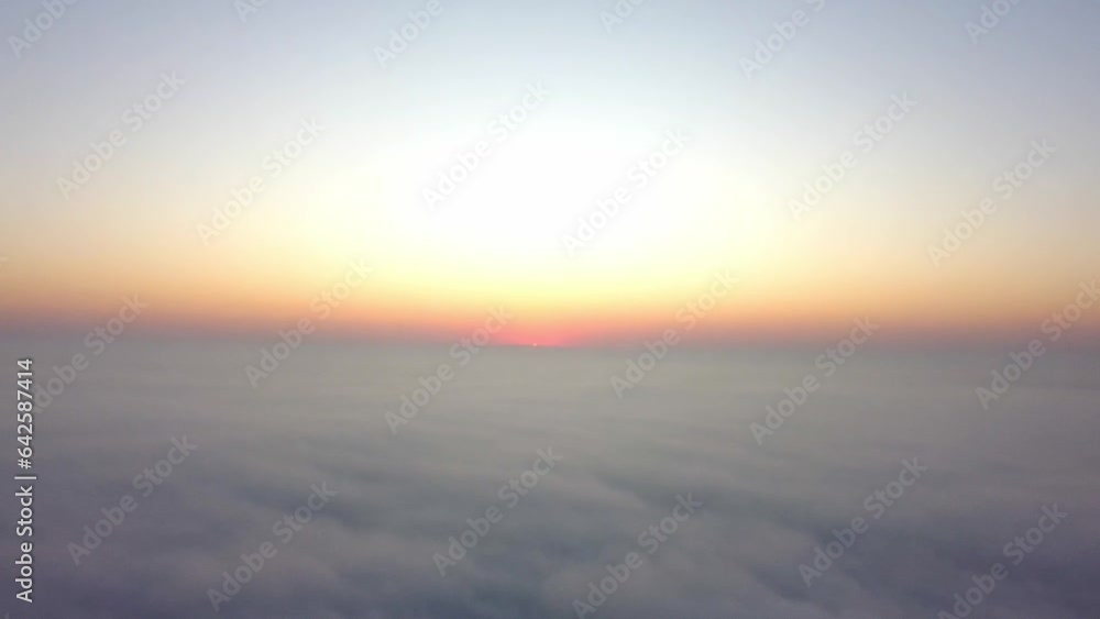 Sunrise, a beautiful sunrise above thick fog on a winter morning in a small town in Brazil, drone scene. Sunrise, a beautiful sunrise above thick fog on a winter morning in a small town in Brazil, drone scene.