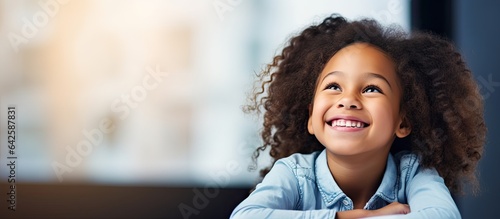 Smiling biracial student in...
