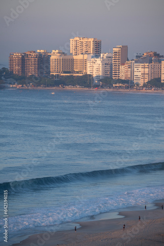 Rio de Janeiro, Brazil: early morning activities on a desert Copacabana beach, one of the famous beaches of the city, named after the Virgen de Copacabana, patron saint of Bolivia photo