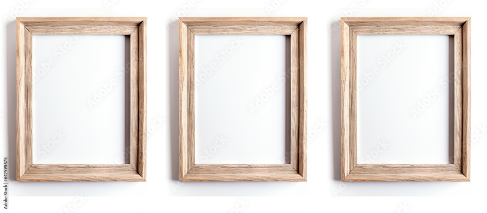 Obraz premium Empty wooden picture frame on white background with space for text