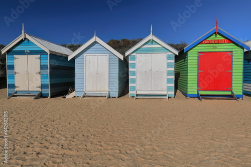 Partial row of the 82 brightly painted Victorian bathing boxes on Dendy Street Beach, Brighton suburb. Melbourne-Australia-901 © rweisswald