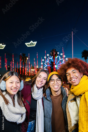 Photography Vertical portrait of diverse group of young people having fun together outdoors