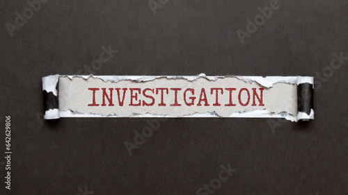 Εκτύπωση καμβά Close-up shot of paper tear with text Investigations.