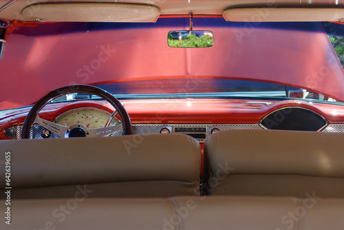 interior of vintage car viewed from the rear seat
