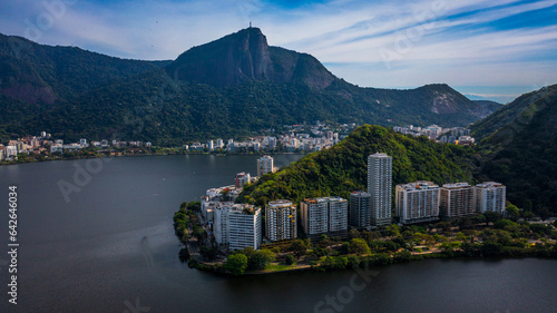 Aerial drone view of Rodrigo de Freitas Lagoon, Ipanema and Leblon neighborhoods and beaches. In the background is Corcovado mountain, Christ the Redeemer and part of the Tijuca National Park. photo