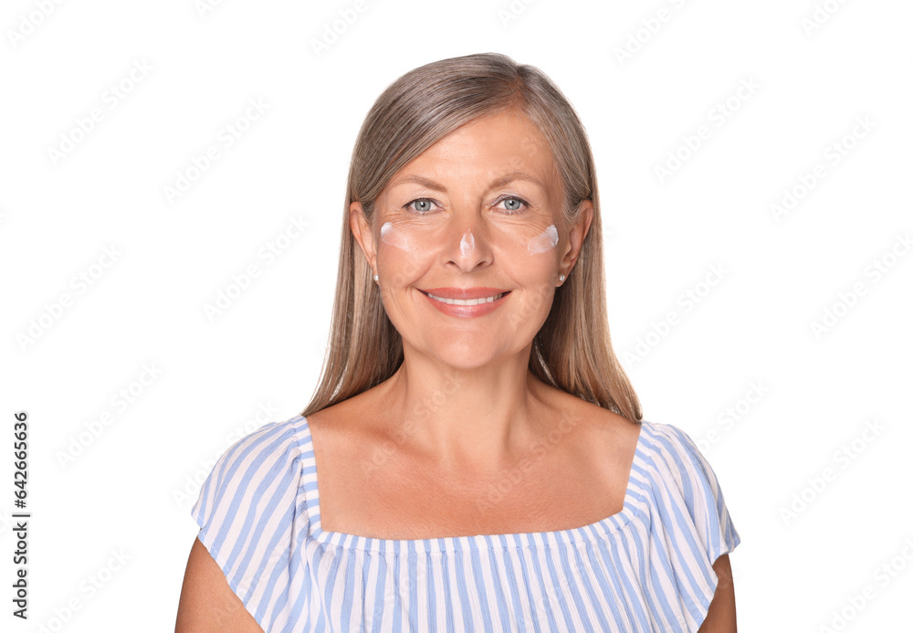 Beautiful senior woman with sun protection cream on her face isolated on white Beautiful senior woman with sun protection cream on her face isolated on white