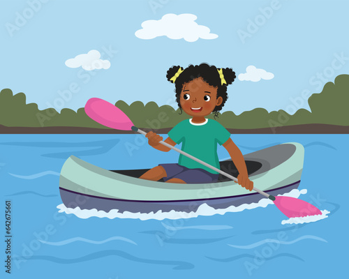 Little African girl rowing in the river