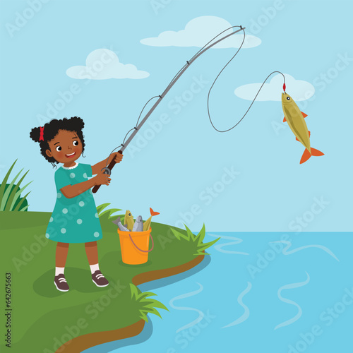 Little African girl fishing at the river catching big fishes