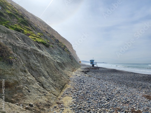 person walking on the beach