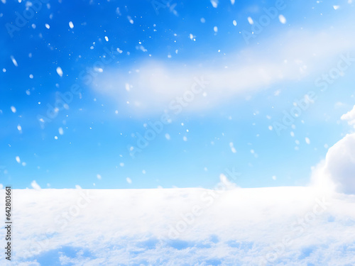 Winter snow background with snowdrifts, bokeh circles, and snowflakes on blue sky. Banner format with copy space © Touhid