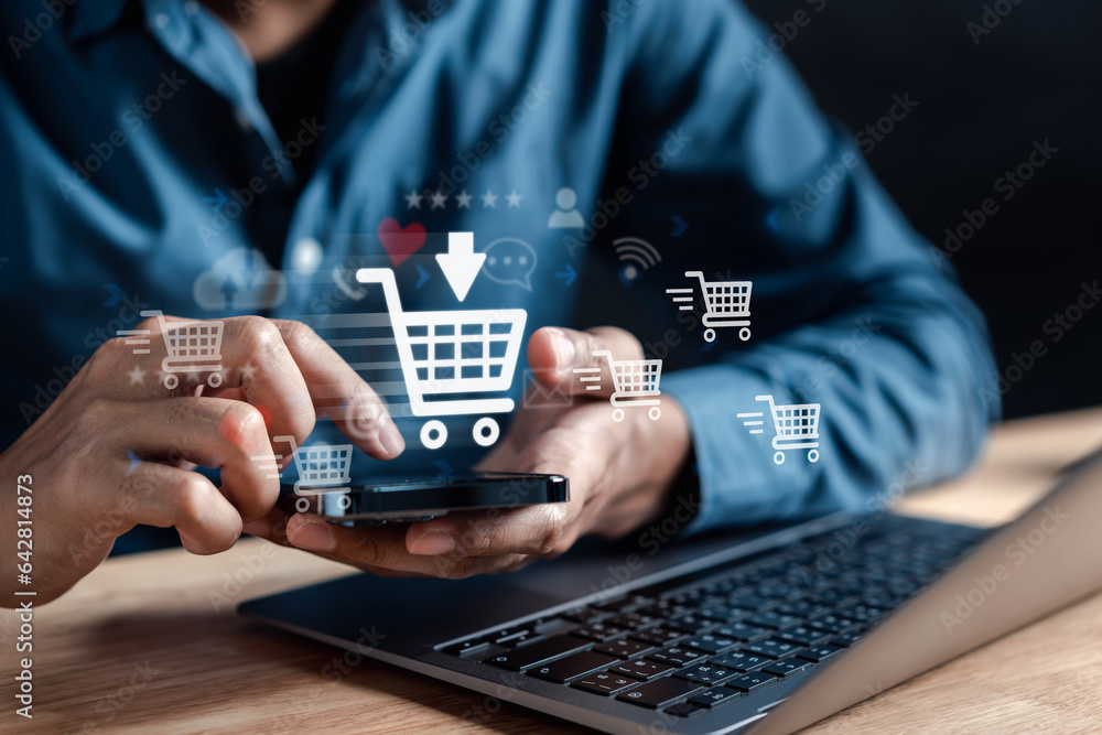 Online E-commerce Shopping on platform Retail Shop via smartphone and computer. Man using online internet to buying product with cart shop icon or business fast shipping delivery chain to customer. Online E-commerce Shopping on platform Retail Shop via smartphone and computer. Man using online internet to buying product with cart shop icon or business fast shipping delivery chain to customer.