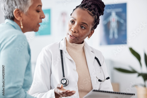 Black woman, doctor and elderly patient for consultation, advice and report with results for health. Healthcare, senior person and medical expert in communication and discussion in hospital office