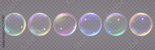 Colored transparent soap bubbles. Water translucent spheres different colors.
