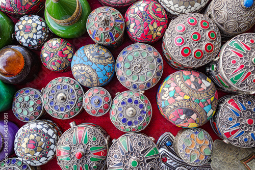 Bilde på lerret Marrakech, Morocco - Feb 10, 2023: Enamel and silver Moroccan Berber pill boxes