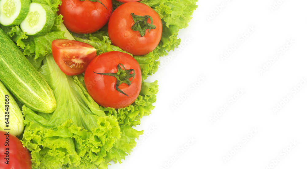 Red pepper, cucumbers and tomatoes on salad leaves background isolated on white. Red pepper, cucumbers and tomatoes on salad leaves background isolated on white.
