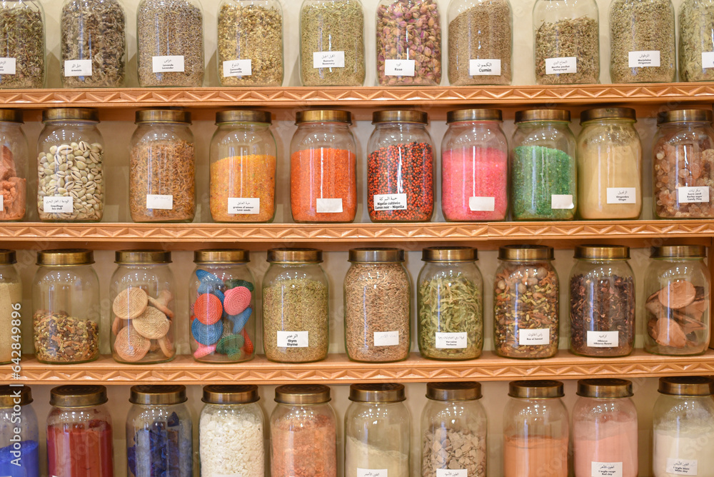 Marrakech, Morocco - Feb 8, 2023: Jars of dried seeds and spices at the Moroccan Museum of Culinary Arts