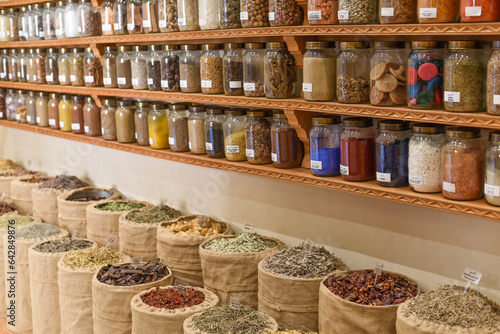Obraz na plátne Marrakech, Morocco - Feb 8, 2023: Jars of dried seeds and spices at the Moroccan