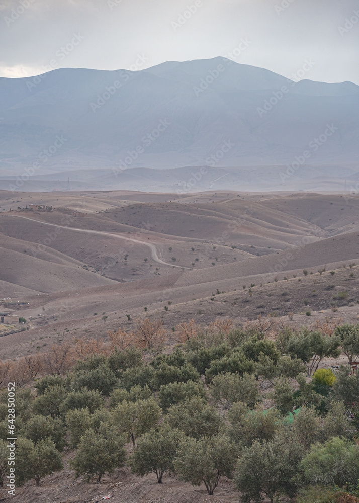 Marrakech, Morocco - 22 Feb, 2023: Landscapes of the Agafay desert and foothills of the Atlas Mountains