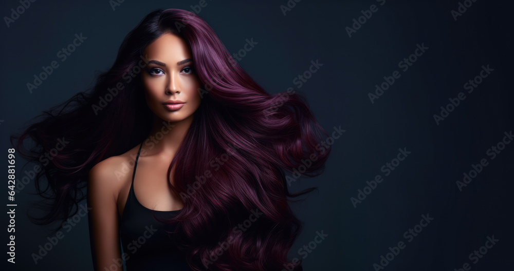 Portrait of a beautiful woman with long purple hair