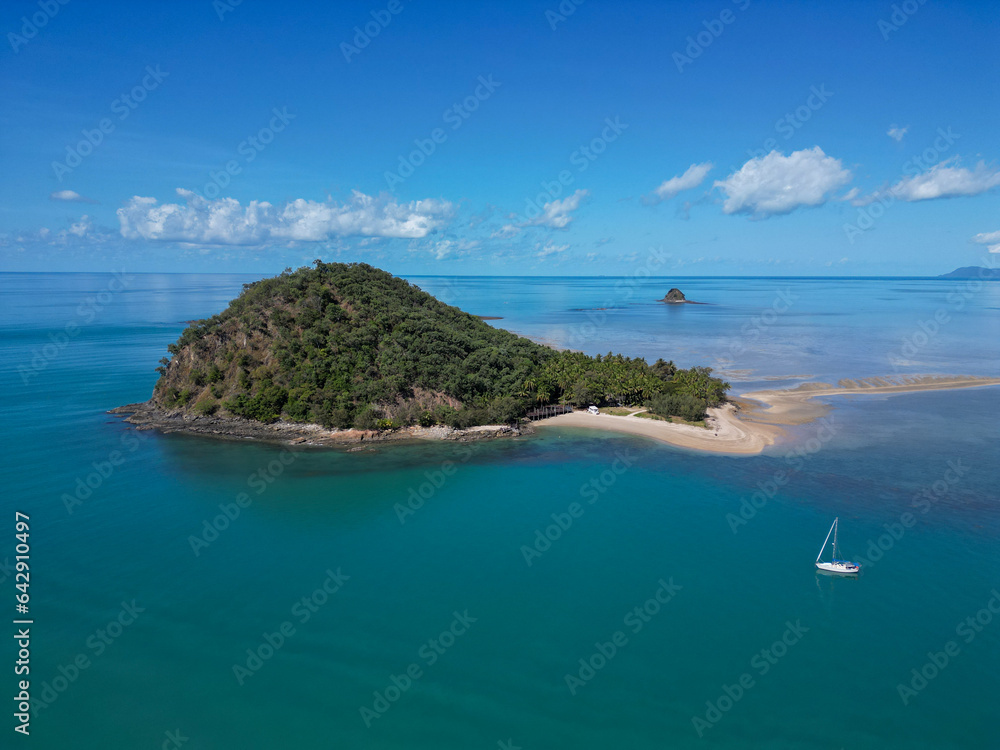 Aerial view of Double Island, palm Cove with crystal clear water and blue sky