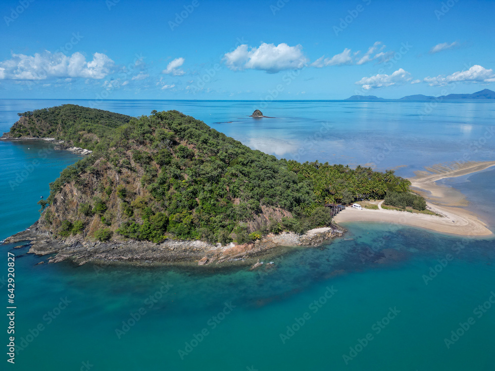Fototapeta premium Aerial view of Double Island, palm Cove with crystal clear water and blue sky