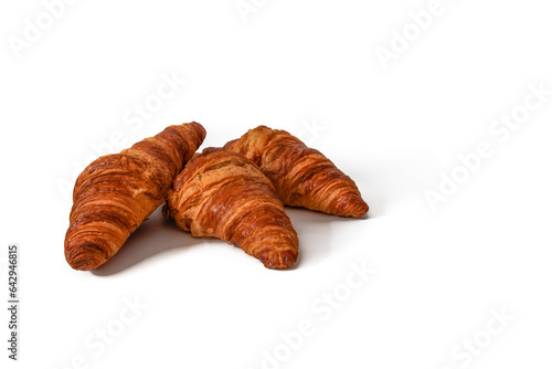 Croissants isolated on a white background. A croissant is a delicate, flaky bun of French origin, golden on the outside and soft on the inside, perfect to enjoy for breakfast or a snack.
