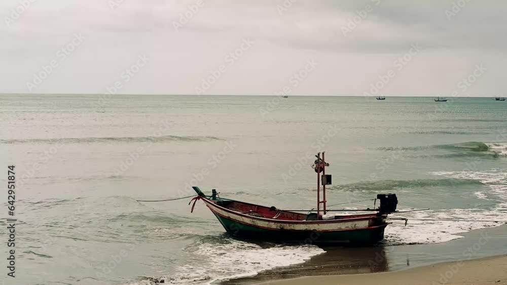Fisherman's boats moored nearby on the beach, and beautiful clouds Fisherman's boats moored nearby on the beach, and beautiful clouds