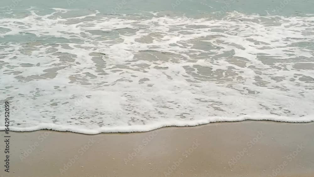 Beautiful beach Ocean waves blowing onto the beach. Beautiful beach Ocean waves blowing onto the beach.