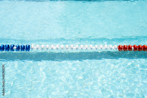 Pool corridor delimiter at a swimming pool. Summer time, outdoor concept, vacation.