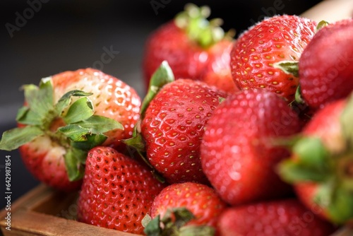 Berry Bounty: 4K Close-Up of Fresh Strawberries and Berries in a Wooden Box