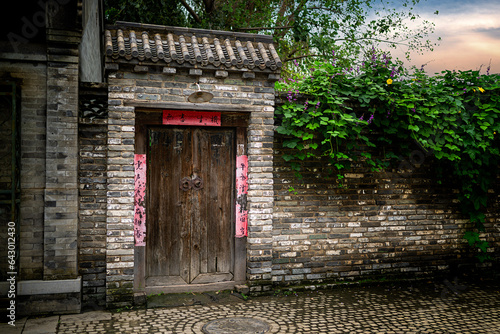Fototapeta Naklejka Na Ścianę i Meble -  old wall with door in Beijing China,alleyway