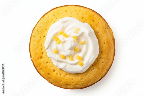 Gluten free corn cake with cream cheese for a healthy breakfast seen from above on a white background