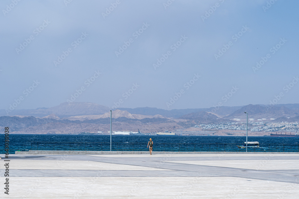 Obraz premium Loneliness tourist woman walking in the fort of Aqaba