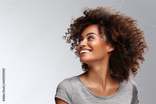 Happy African American woman, beautiful afro girl, Curly black hair, attractive lady with a stunning smile