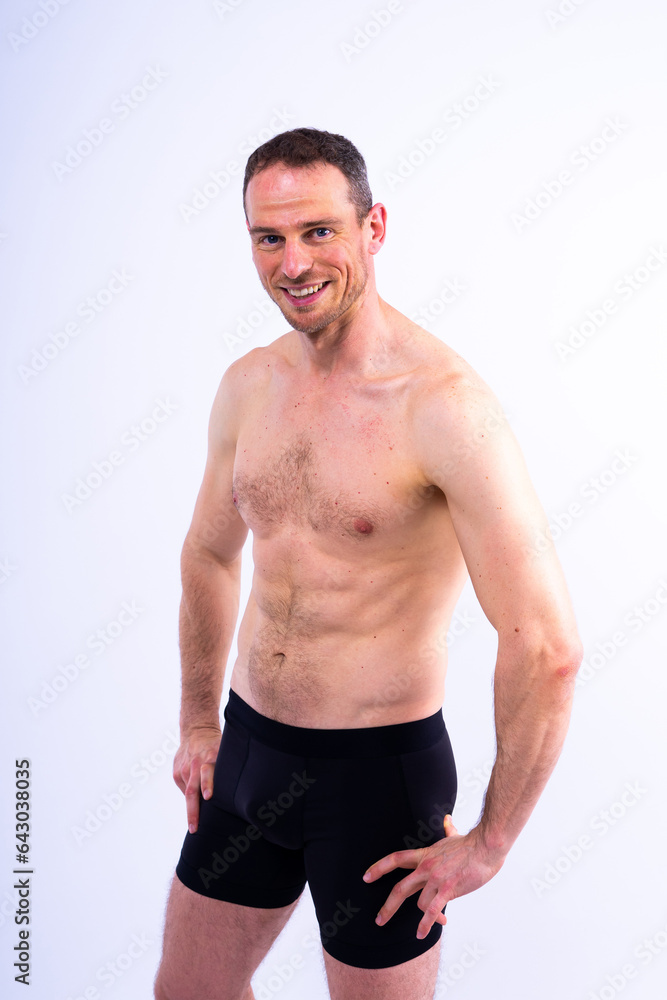 Portrait of man, bodybuilder and bicep flex in studio, background and exercise for muscular power. Portrait of man, bodybuilder and bicep flex in studio, background and exercise for muscular power.